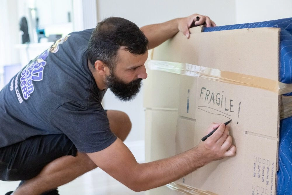Boston mover packing fragile item